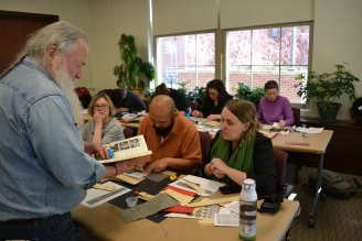 Lilly Library book conservator Jim Canary discusses palm leaf production with Katherine Tachau, Kalzang Dorjee Bhutia, and Amy Holmes-Tagchungdarpa at the Mellon Sawyer workshop